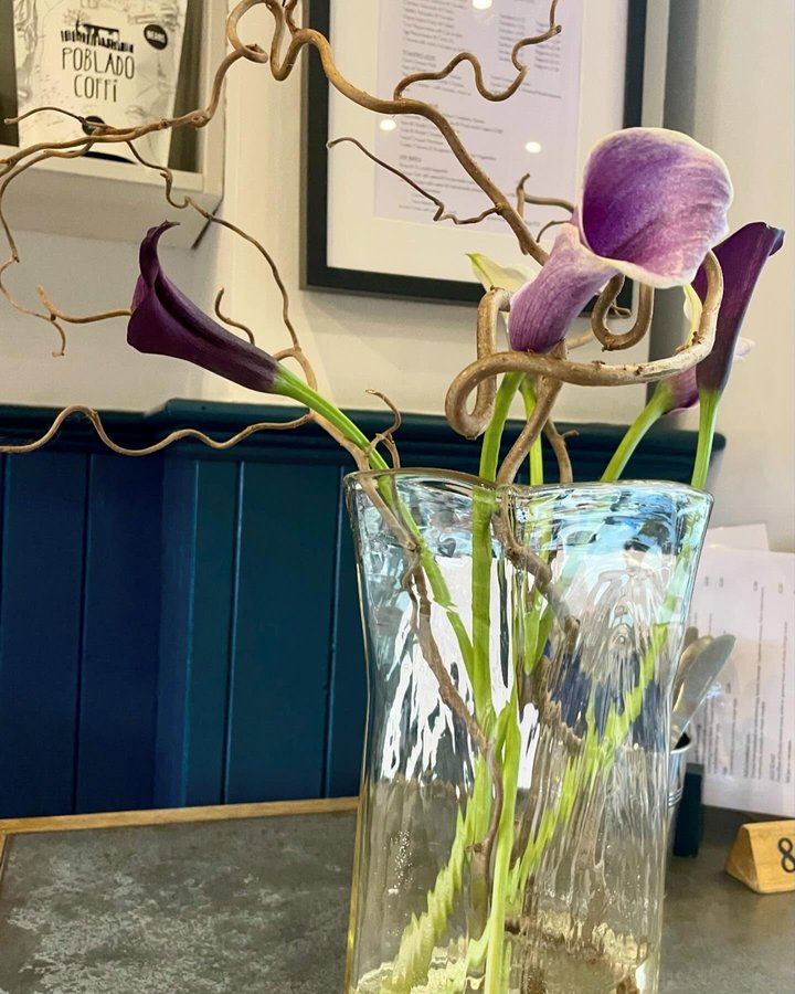 Flowers and coffee bags at Toast Coffee House