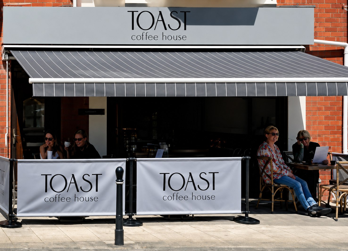 Toast Coffee House shopfront on the High Street, Tywyn